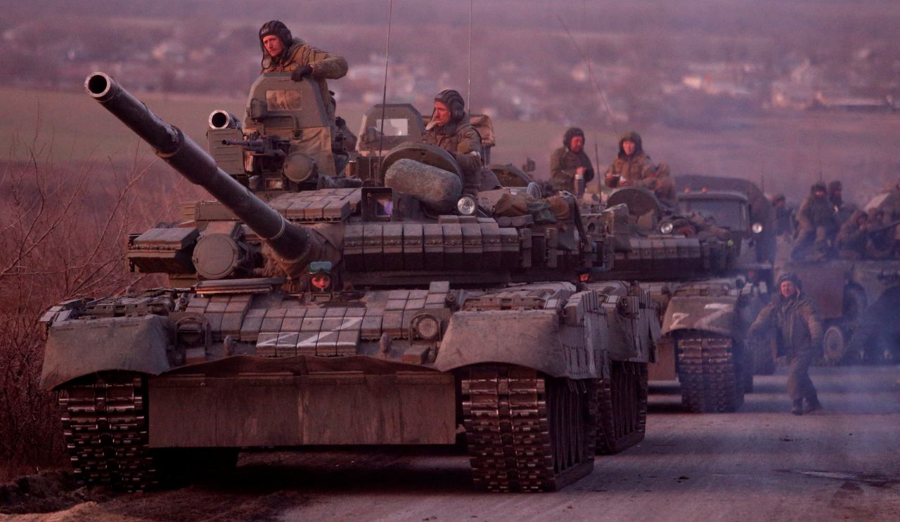 An armored convoy of pro-Russian troops travel on a road leading to Mariupol on March 28.