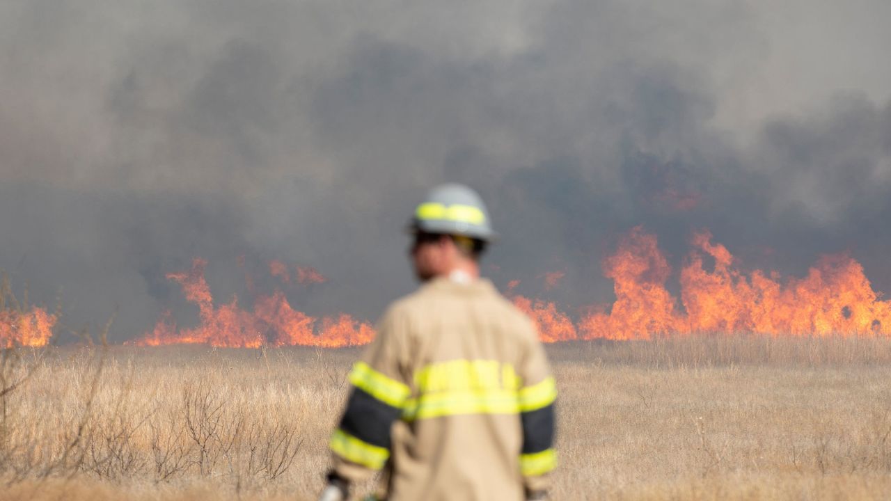 Area fire departments and the Wichita County Sheriff's Office respond March 20 to a large wildfire west of Wichita Falls and south of Holliday in Texas.