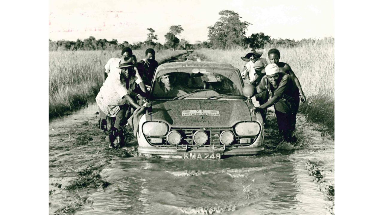 A team receives a push through deep mud in Usumbaras, Tanzania during the 1968 race. As is the case with the classic rally now, the public were permitted to help drivers who got stuck.