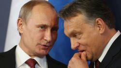 BUDAPEST, HUNGARY - FEBRUARY 17:  Russian President Vladimir Putin (L) and Hungarian Prime Minister Viktor Orban converse during a signing ceremony of several agreements between the two countries at Parliament on February 17, 2015 in Budapest, Hungary. Putin is in Budapest on a one-day visit, his first visit to an EU-member country since he attended ceremonies marking the 70th anniversary of the D-Day invasions in France in June, 2014.  (Photo by Sean Gallup/Getty Images)