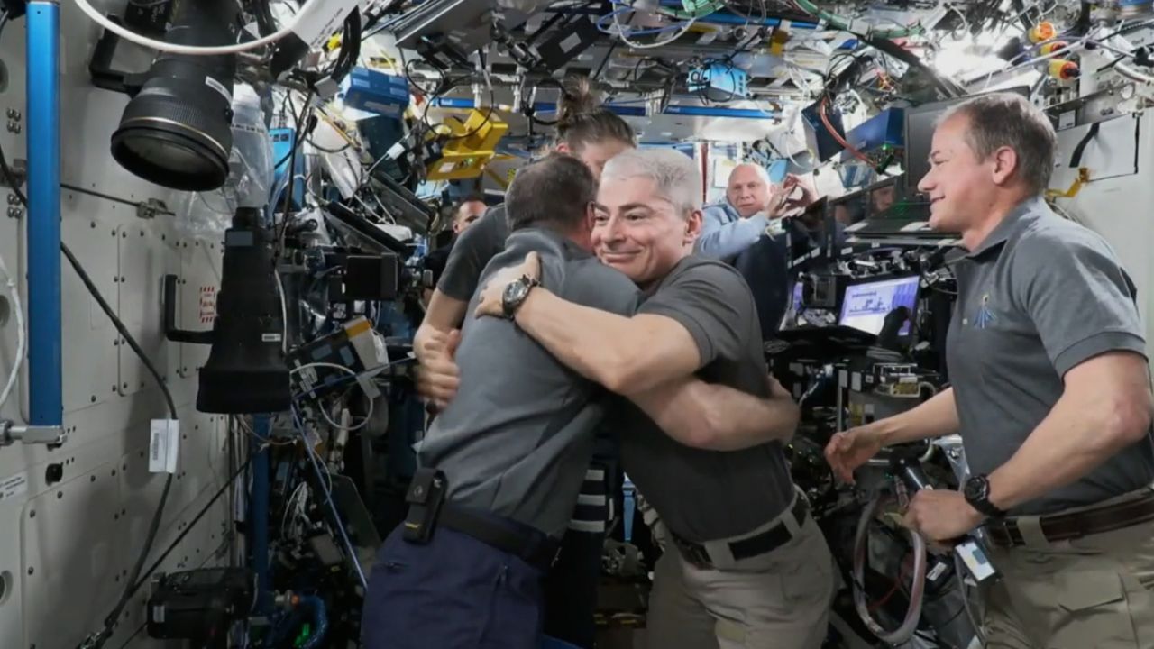 Russian cosmonaut Anton Shkaplerov and NASA astronaut Mark Vande Hei embraced during the change of command ceremony.