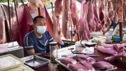 WUHAN, CHINA - MAY 31:  A vendor sells pork at an open market on May 31, 2021 in Wuhan, China. A renewed interest in the origins of COVID-19 has emerged after U.S. President Joe Biden announced he was expanding investigation into the outbreak, with intelligence agencies leaning towards a theory of a lab leak of the virus. (Photo by Getty Images)