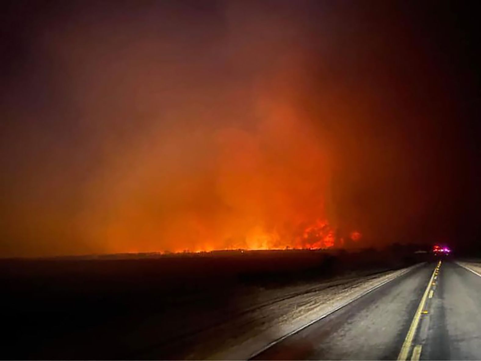 A wildfire lights up the night sky in central Texas on March 18.