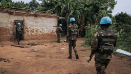 Bangladeshi soldiers of MONUSCO (the United Nations mission in DR Congo) inspect destroyed houses in Dhedja in search of the bodies of people killed by Codeco militiamen on December 19, 2021, 60 kilometers from Bunia, the provincial capital of Ituri in northeastern DR Congo. - Since late November, at least 100 people have been killed by militiamen in this area. Because of the insecurity and the presence of the militiamen, no one has been able to go and bury the bodies in Dhedja. For the past two years, thousands of armed men in the Ituri hills have been attacking villages, IDP camps and military positions in the name of the Cooperative for the Development of Congo, Codeco, an armed group structured around a religious sect. They claim to be defending the interests of the Lendu tribe against the army and the Hema tribe.