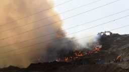 Firefighters trying to douse fire at Ghazipur Landfill on March 28, 2022 in New Delhi, India.