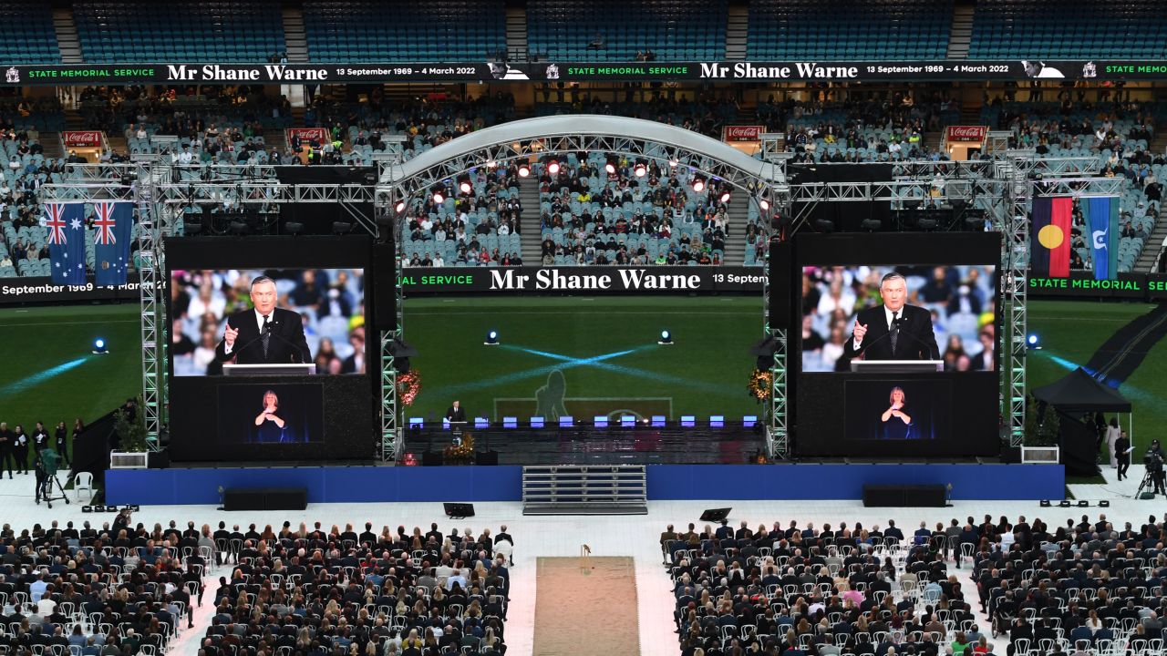 Master of Ceremonies Eddie McGuire speaks at the beginning of the state memorial service for former Australian cricketer Shane Warne at the Melbourne Cricket Ground on March 30.