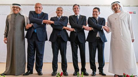 (Left to right) Bahrain's Foreign Minister Abdullatif al-Zayani, Egypt's Foreign Minister Sameh Shoukry, Israel's Foreign Minister Yair Lapid, US Secretary of State Antony Blinken, Morocco's Foreign Minister Nasser Bourita, and the United Arab Emirates' Foreign Minister Sheikh Abdullah bin Zayed al-Nahyan pose for a group photo following their meeting on Monday. 