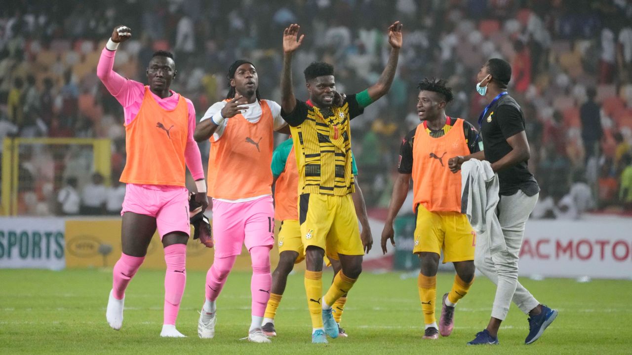 Ghana's players, including goalscorer Thomas Partey (center), celebrate qualifying for the 2022 World Cup in Qatar. 
