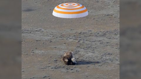 The Soyuz MS-19 spacecraft is seen as it lands in a remote area near the town of Zhezkazgan, Kazakhstan with  Mark Vande Hei of NASA, and Russian cosmonauts Pyotr Dubrov, and Anton Shkaplerov Wednesday, March 30.