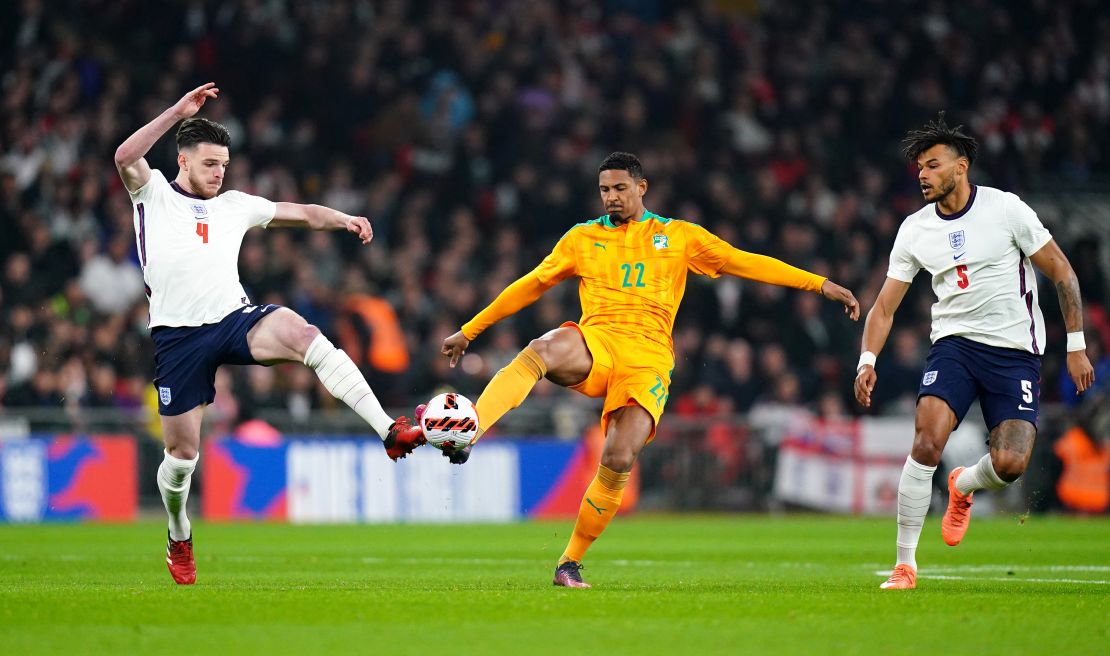 England's Declan Rice (left) and Ivory Coast's Sebastien Haller battle for the ball during a friendly match at Wembley Stadium.