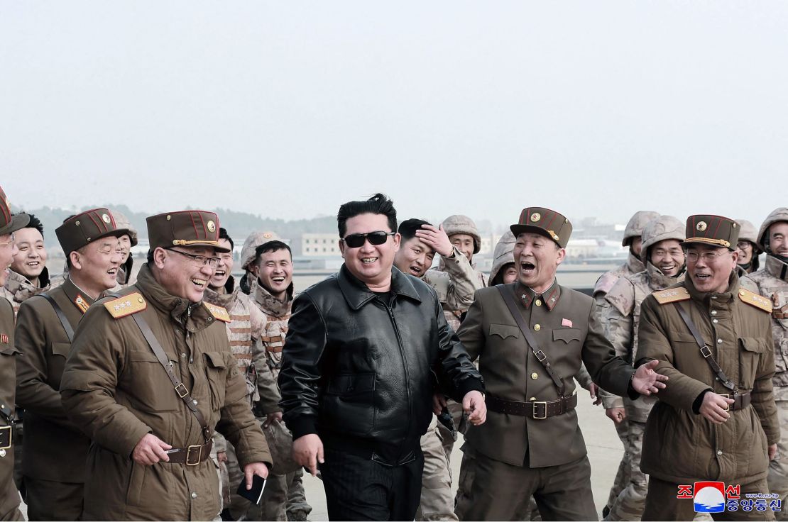 
This picture from North Korean state media, purportedly taken on March 24, shows leader Kim Jong Un walking with North Korean military personnel during the test launch operation of what state media reported was a new type intercontinental ballistic missile.