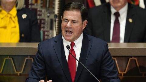 FILE — Arizona Republican Gov. Doug Ducey gives his state of the state address at the Arizona Capitol, Monday, Jan. 10, 2022, in Phoenix. GOP lawmakers thrust Arizona into the national culture wars Thursday, March 24, 2022, when they passed three bills in party-line votes banning abortion after 15 weeks, prohibiting transgender girls from playing on girls sports teams and restricting gender-affirming health care for minors. (AP Photo/Ross D. Franklin, File)