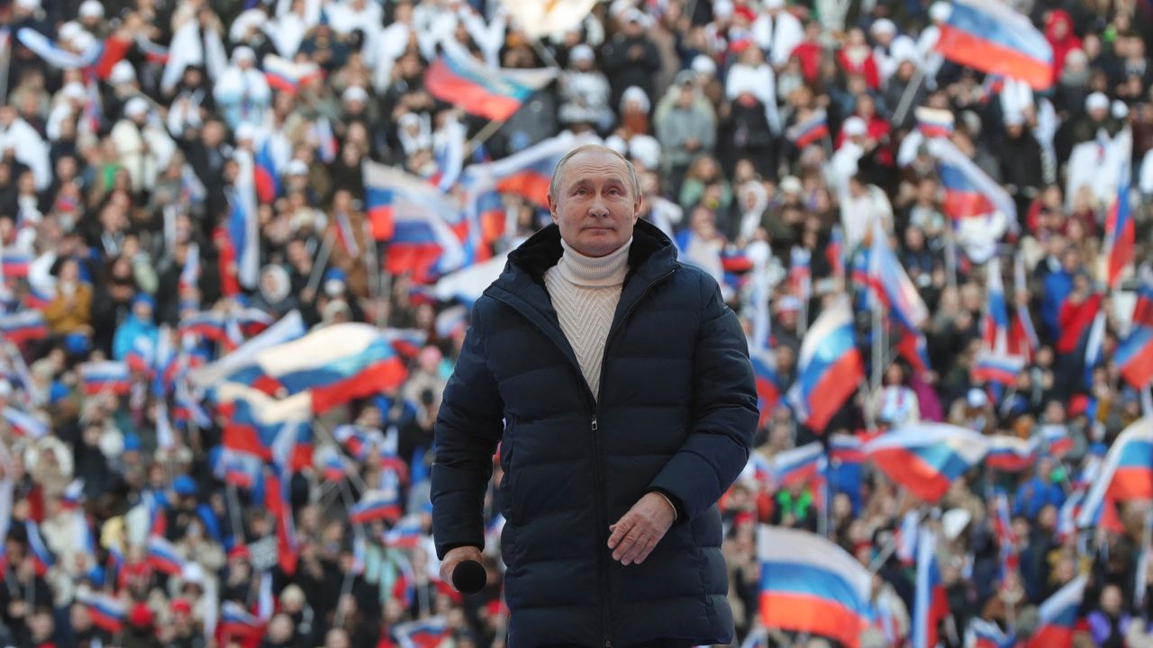 Russian President Vladimir Putin speaks at a celebration marking the eighth anniversary of Russia's annexation of Crimea at the Luzhniki stadium in Moscow on March 18, 2022. 