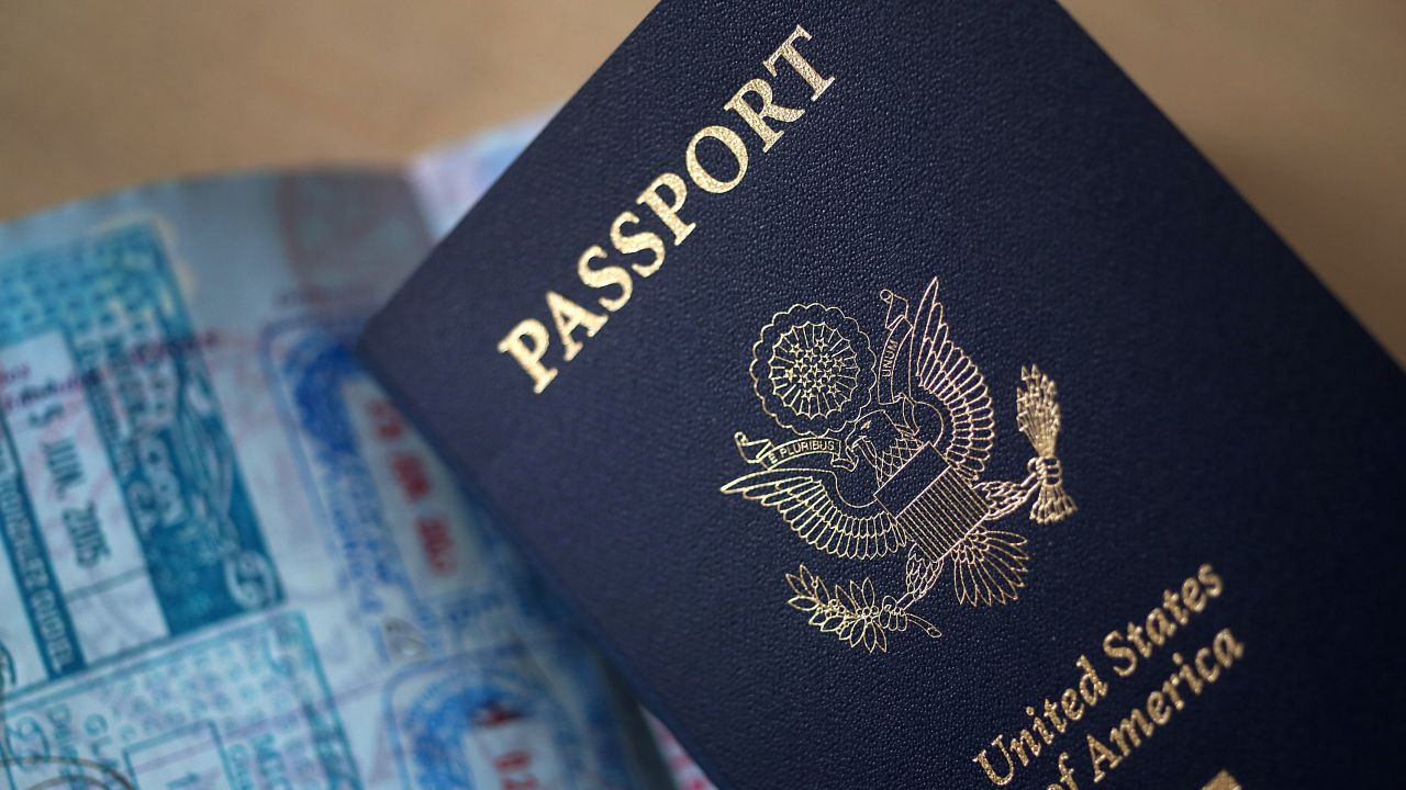 U.S. passports are arranged for a photograph in New York on Tuesday, April 23, 2013.