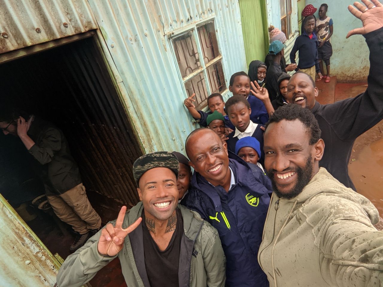 King also likes to give back to the communities around the mountains he climbs by volunteering with local nonprofits. He's pictured here with members of the Moving Mountain Trust in Nairobi, Kenya before making the trek up Mt. Kenya on December 8, 2021.
