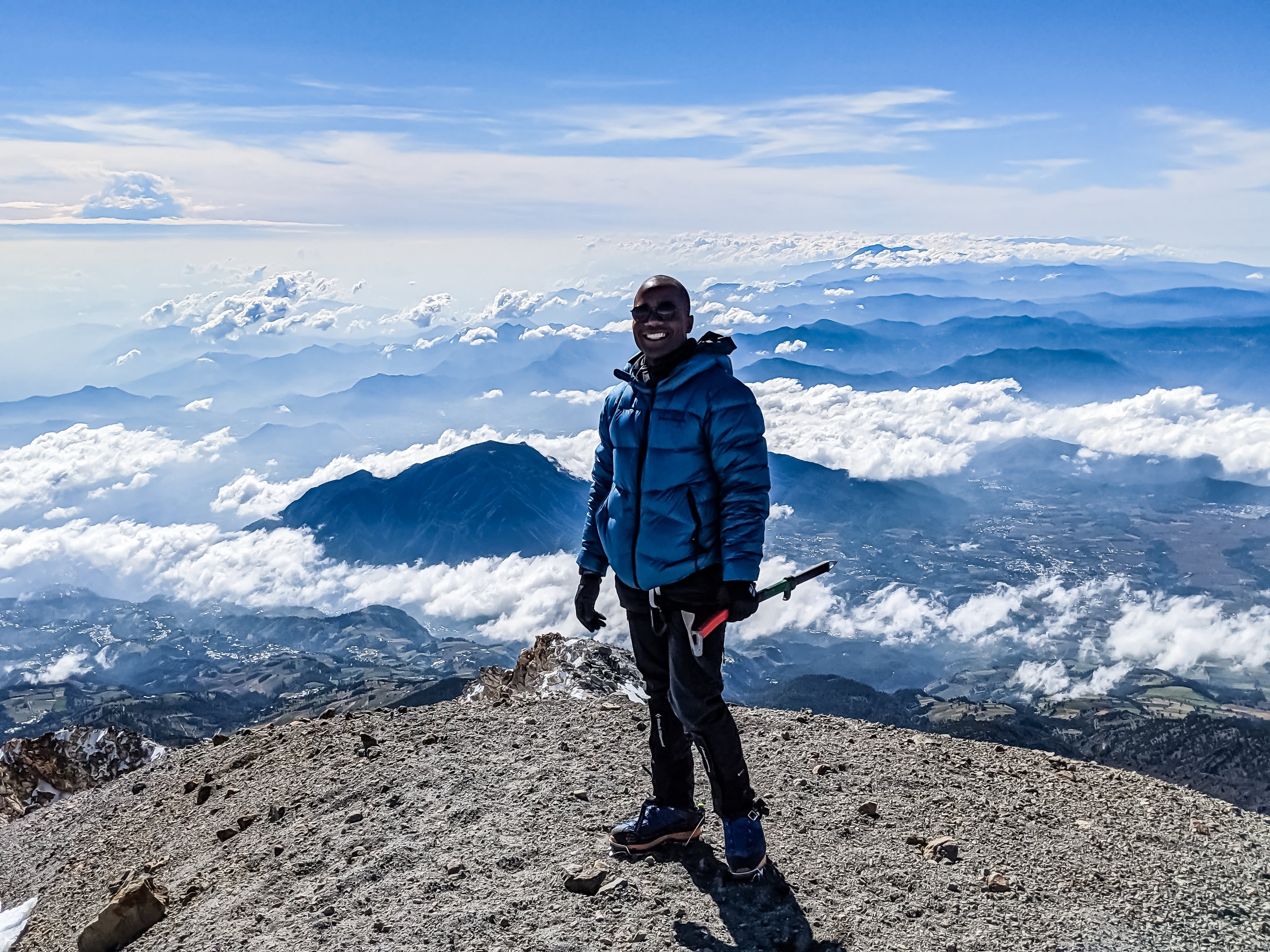 Over the next eight years, King wants to tackle the classic seven summits and the seven tallest volcanic summits on each continent. He would be the first Black man to do so -- however, his purpose is larger than himself; instead, he says, it's about giving Black people "the ability to see themselves in a higher place, a bigger pew." Pictured here, he's on top of Pico de Orizaba, the tallest volcanic peak in North America.