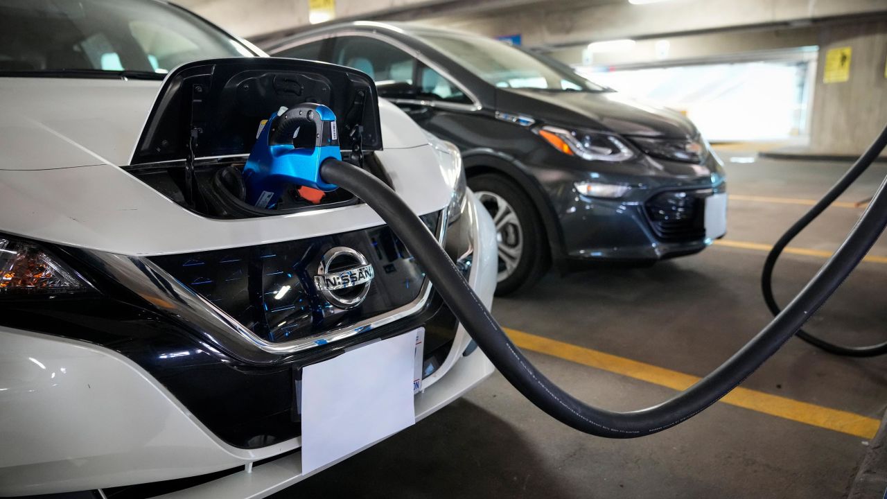 Electric vehicles are displayed before a news conference with White House Climate Adviser Gina McCarthy and Secretary of Transportation Pete Buttigieg. The Biden administration is hoping to increase critical mineral production to kickstart the EV and renewable energy supply chains.