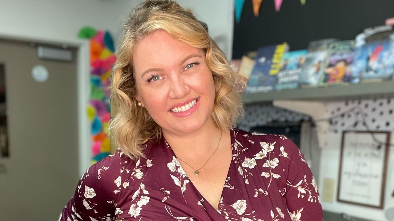 Meghan Mayer moved her Pride flag from inside her classroom to her window so students passing by could see it and know they have an ally, she said.