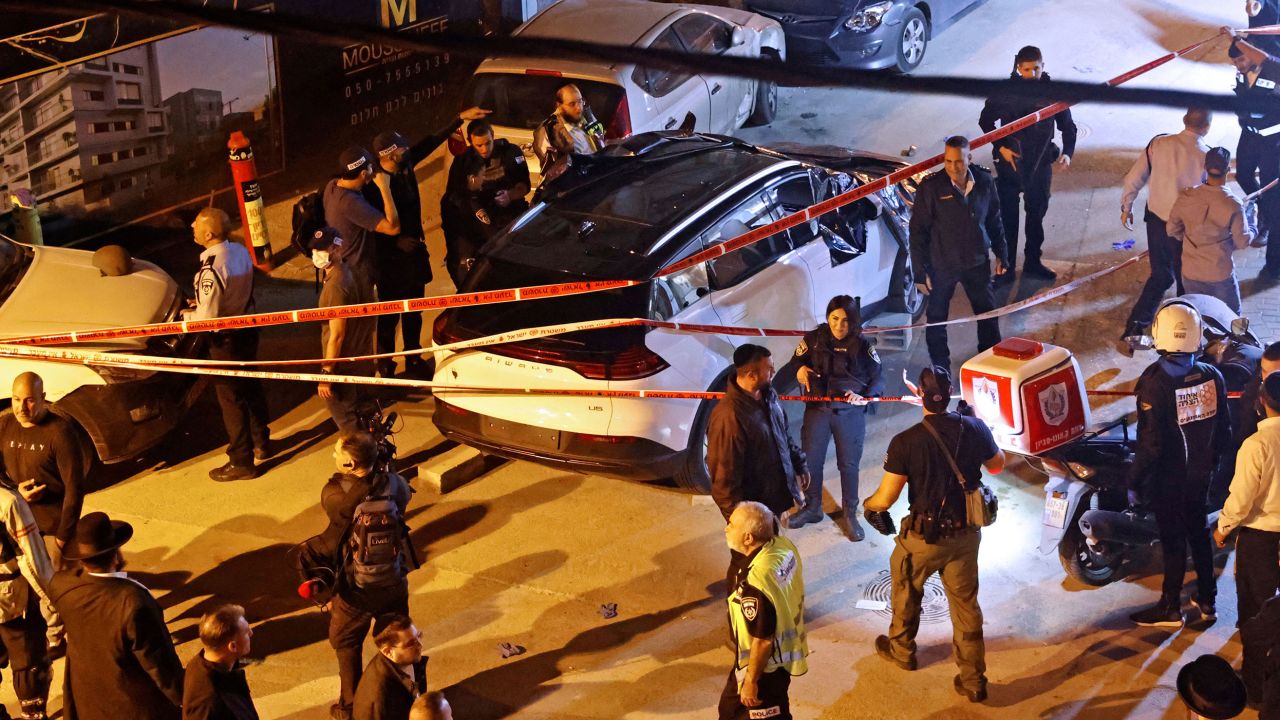 Emergency personnel and Israeli security forces at the scene of a shooting in Bnei Brak on March 29.