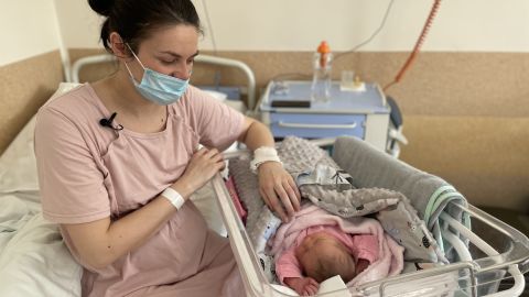 Khrystyna Pavluchenko takes care of her newborn daughter, Adelina.
