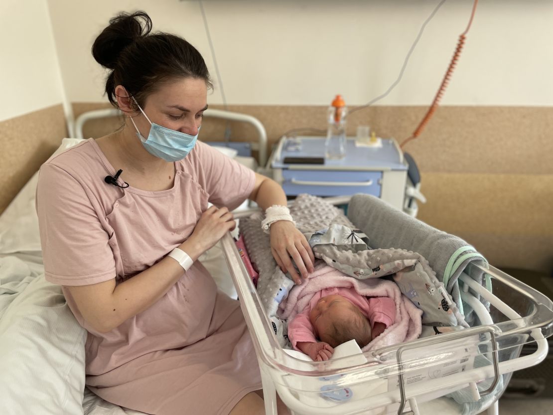 Khrystyna Pavluchenko tends to her newborn daughter, Adelina.