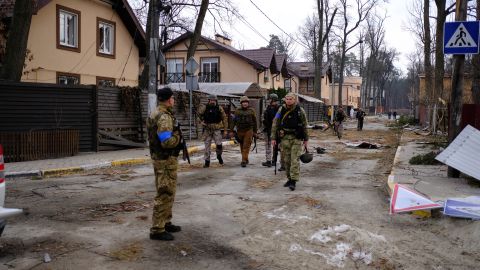 Irpin Mayor Oleksandr Markushin leads one of the special force units looking for Russian infiltrators still present in the town.