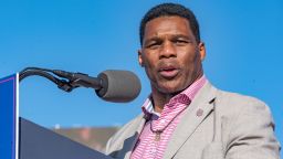 Former Heisman Trophy winner and candidate for US Senate Herschel Walker (R-GA) speaks to supporters of former U.S. President Donald Trump during a rally at the Banks County Dragway on March 26, 2022 in Commerce, Georgia. 