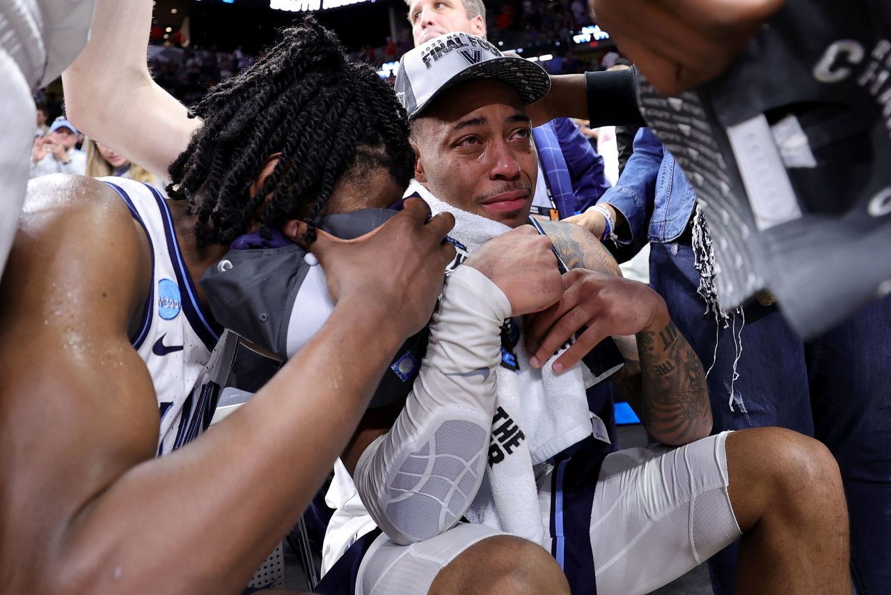 Villanova's Justin Moore is in tears after his team defeated Houston to advance to the Final Four on Saturday, March 26. Moore tore his Achilles during the game and will miss the rest of the season.