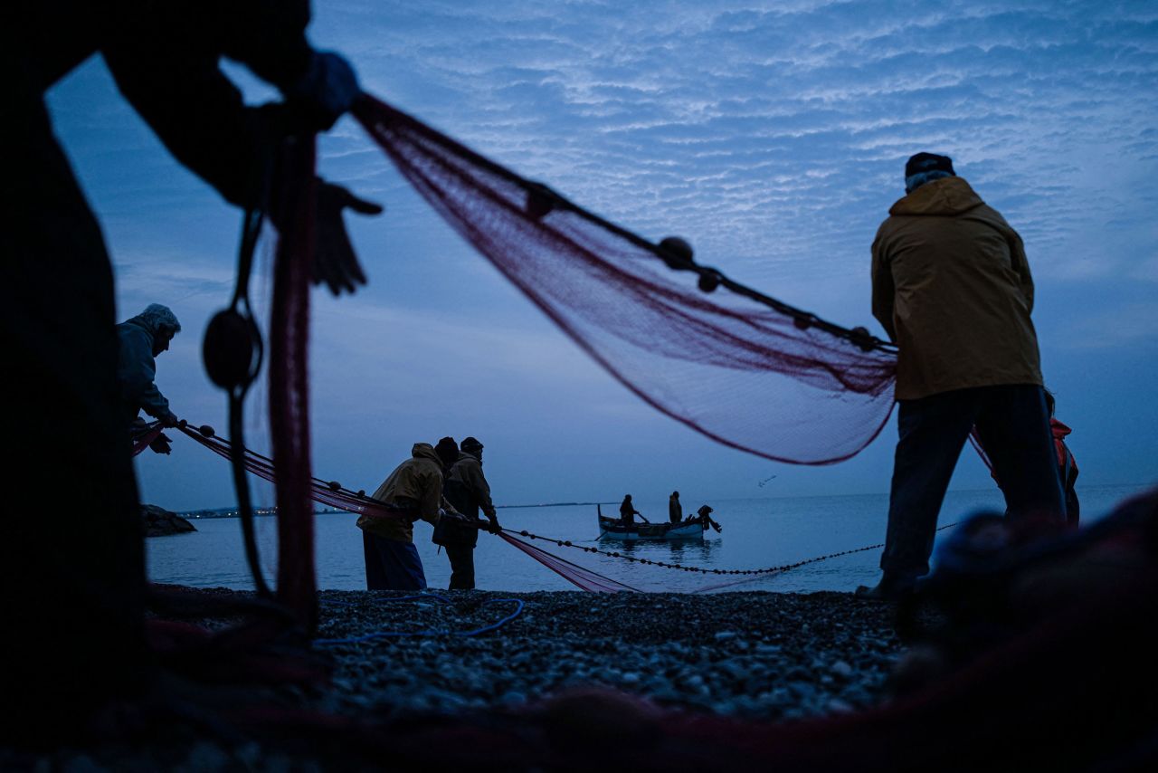 Fishermen try to bring in tiny baby fish in Cagnes-sur-Mer, France, on Tuesday, March 29. <a href="https://www.seenice.com/produce/guide/la-poutine-the-fry-of-anchovies-and-sardines-695264" target="_blank" target="_blank">The jelly-like "poutine" pulp</a> is exclusively fished on the French Riviera, between Antibes and Menton, for only 45 days each year. <a href="http://www.cnn.com/2022/03/24/world/gallery/photos-this-week-march-17-march-24/index.html" target="_blank">See last week in 40 photos.</a>