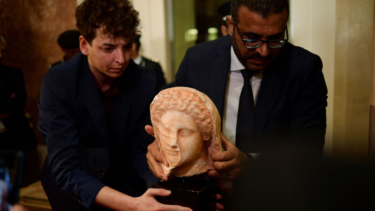 The Libyan Antiquities Authority holds a ceremony on March 31 for the repatriation of the artifacts returned by the US Department of Homeland Security, including the marble antiquity of "The Veiled Head of a Lady" and other looted artifacts at the Royal Palace in Tripoli, Libya. 