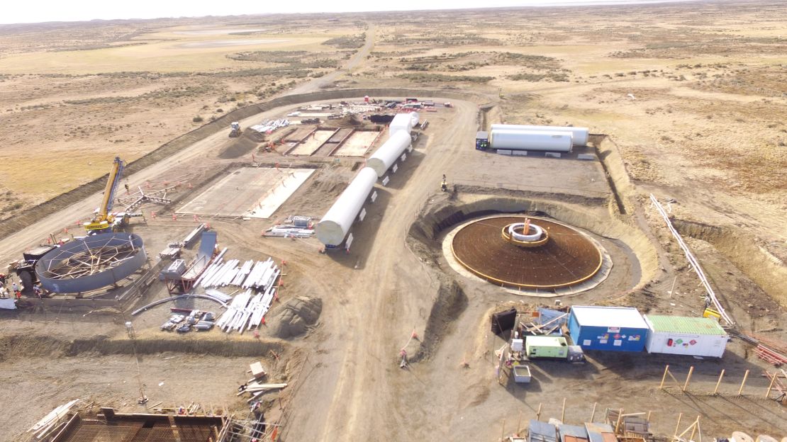 An aerial view of the construction site, including the foundations for its wind turbine.