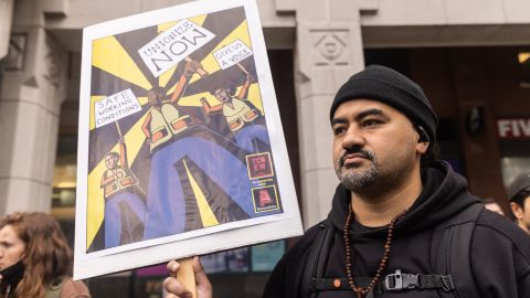 A demonstrator during the vote count to unionize Amazon workers outside the National Labor Relations Board offices in the Brooklyn borough of New York, U.S., on Friday, April 1, 2022. 