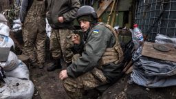 TOPSHOT - A Ukrainian serviceman smokes a cigaret in a trench at the front line east of Kharkiv on March 31, 2022. - Russian forces are repositioning in Ukraine to strengthen their offensive on the Donbass, Nato said on March 31, 2022, on the 36th day of the Russian-Ukrainian conflict, as shelling continues in Kharkiv (north) and Mariupol (south). (Photo by FADEL SENNA / AFP) (Photo by FADEL SENNA/AFP via Getty Images)