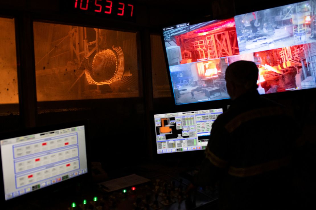 A worker mans the control room at the Evraz steel mill in Pueblo.