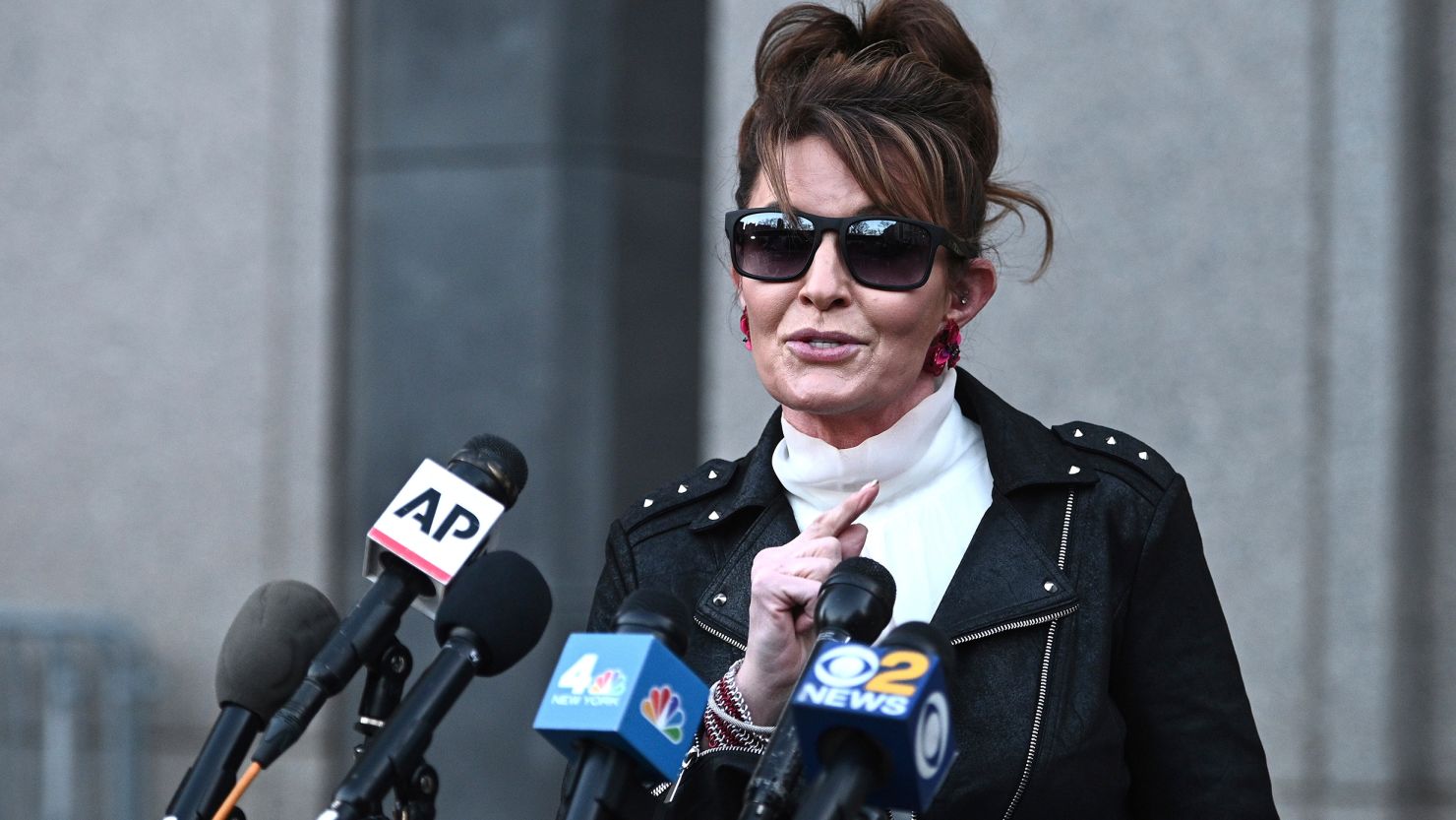 Former Alaska Gov. Sarah Palin speaks to the media as she leaves the US District Court, in New York on February 14, 2022.