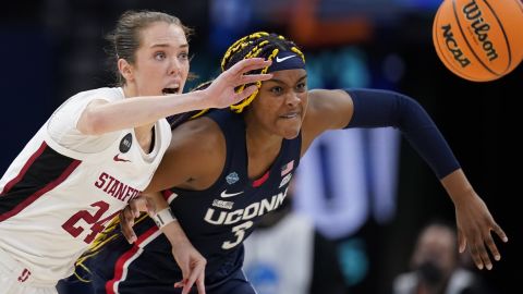 Stanford's Lacie Hull and UConn's Aaliyah Edwards go after a loose ball during the second half of the Women's Final Four NCAA tournament semifinal Friday in Minneapolis. 