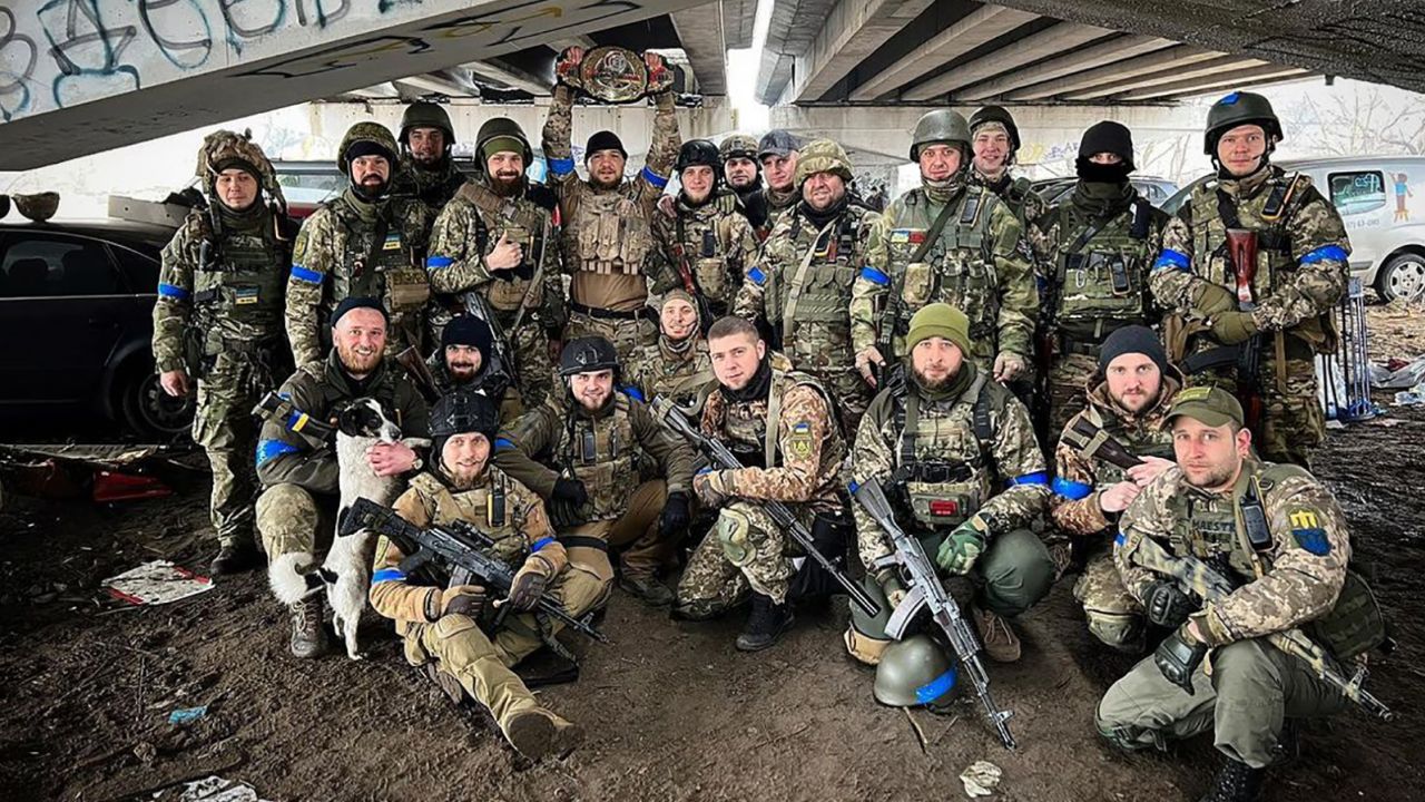 MMA champion Yaroslav Amosov recovered his belt from the rubble of his Iprin home.