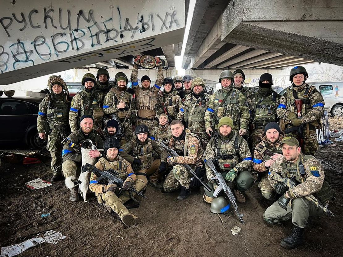 MMA champion Yaroslav Amosov recovered his belt from the rubble of his Iprin home.