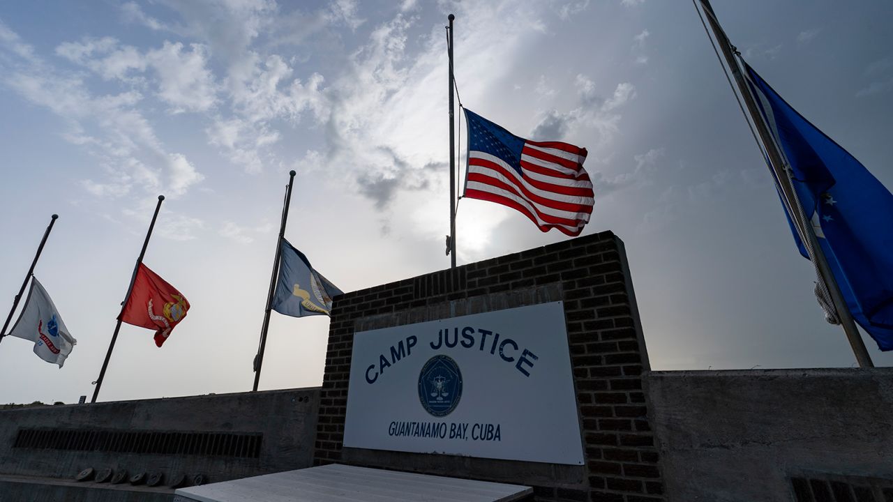 Flags are seen flying at half-staff at Camp Justice, August 29, 2021, in Guantanamo Bay Naval Base, Cuba.