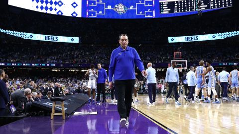 Duke head coach Mike Krzyzewski walks off the court after losing to the North Carolina Tar Heels in the 2022 NCAA Men's Basketball Tournament Final Four semifinal at Caesars Superdome Saturday in New Orleans.