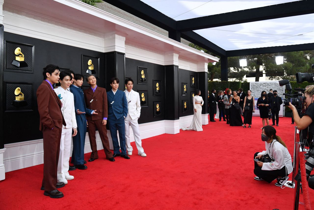 BTS poses on the red carpet before the show. <a href="http://www.cnn.com/style/article/2022-grammys-red-carpet-fashion/index.html" target="_blank">See more red carpet photos.</a>