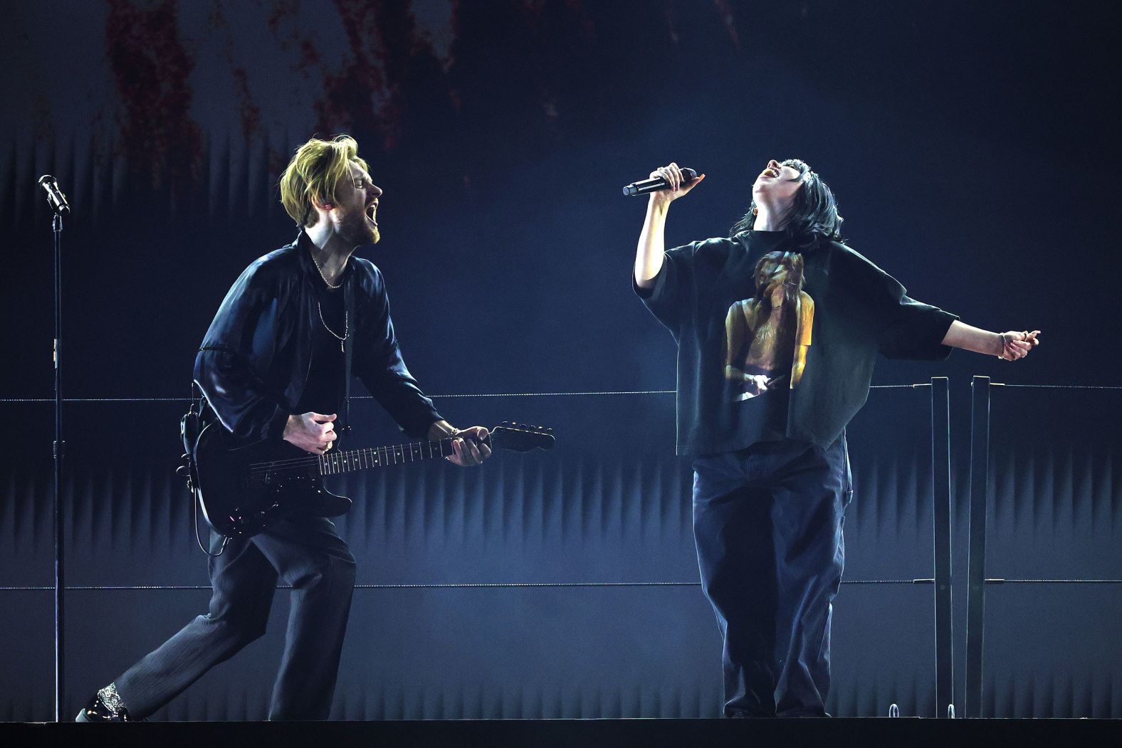 Billie Eilish performs her song "Happier Than Ever" with help from her brother, Finneas. He also co-wrote the song.