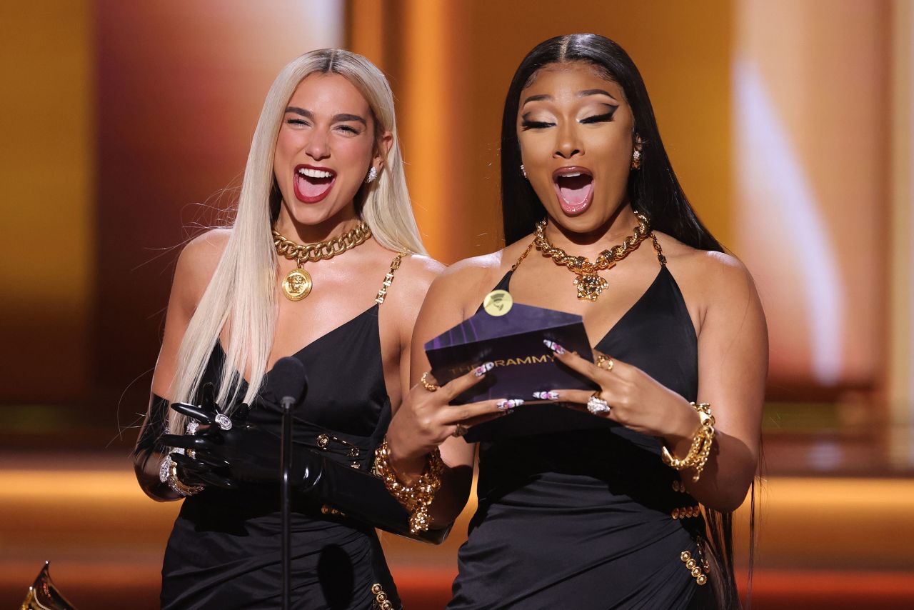 Dua Lipa, left, and Megan Thee Stallion present an award during the show.