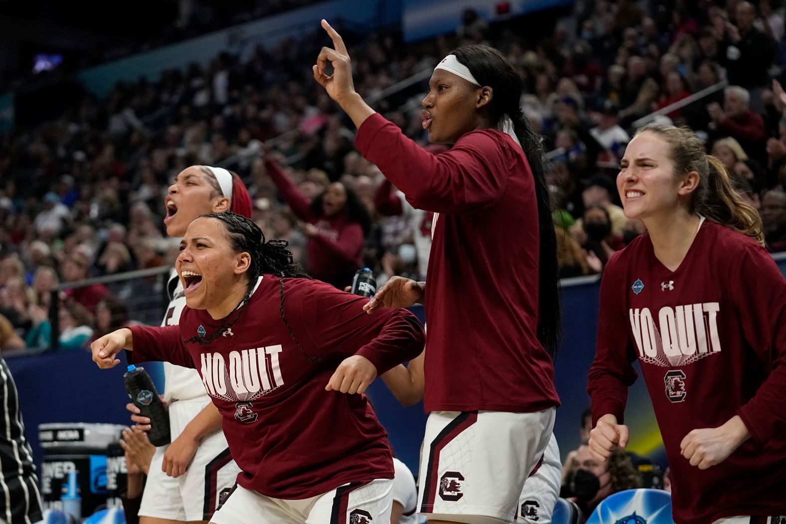 The South Carolina bench reacts to a play in the first half.