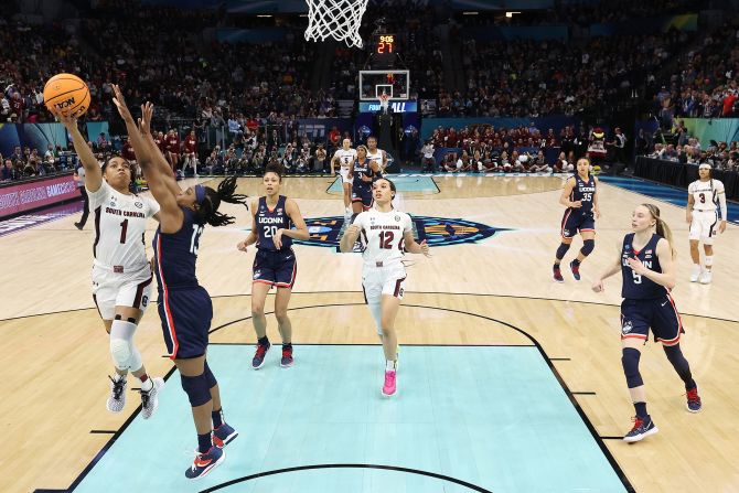 South Carolina's Zia Cooke is defended by UConn's Christyn Williams during the first half. South Carolina led 35-27 at halftime.