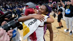 South Carolina's Aliyah Boston and Victaria Saxton celebrate after a college basketball game in the final round of the Women's Final Four NCAA tournament against UConn Sunday, April 3, 2022, in Minneapolis. South Carolina won 64-49 to win the championship. (AP Photo/Eric Gay)