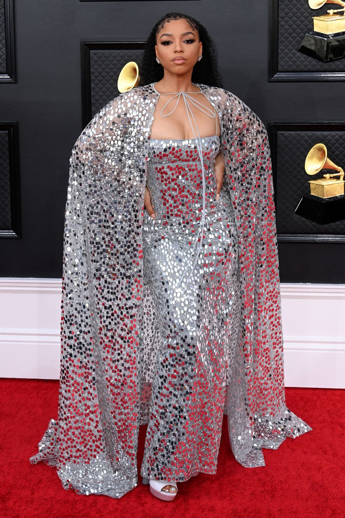 Chloe Bailey wowed in a floor-length silver sequined gown, later tweeting "ima disco ball baby."