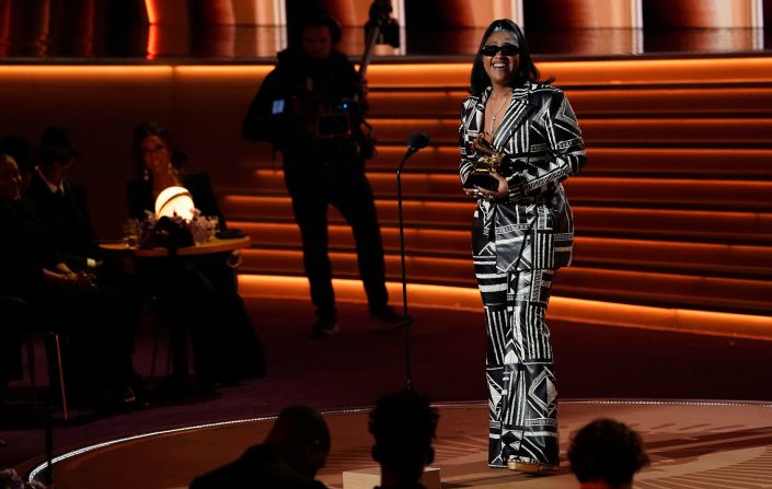 Jazmine Sullivan accepts the award for best R&B album ("Heaux Tales").