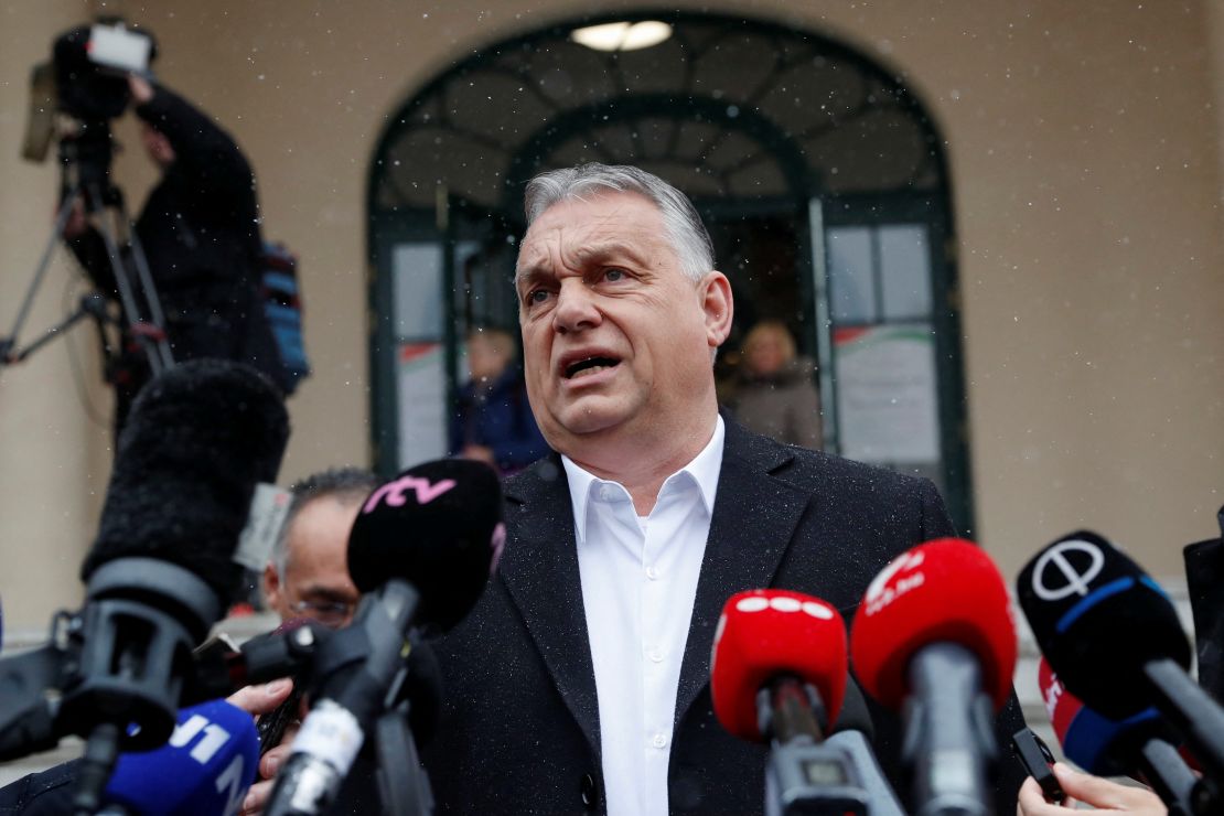 Hungarian Prime Minister Viktor Orban gives a statement to the media after leaving a polling station on April 3. 
