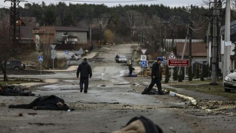 Bodies lie on a street in Bucha, northwest of Kyiv, on April 2, 2022.